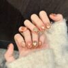 Caramel Starburst Orange-Brown Fine Glitter Heart Design Whitening Press-On Nails